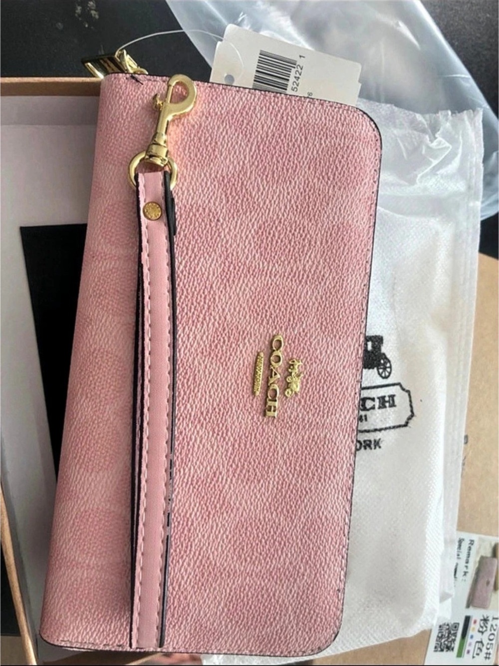 Signature Accordion Zip Around Wallet with Wrist Strap Pink